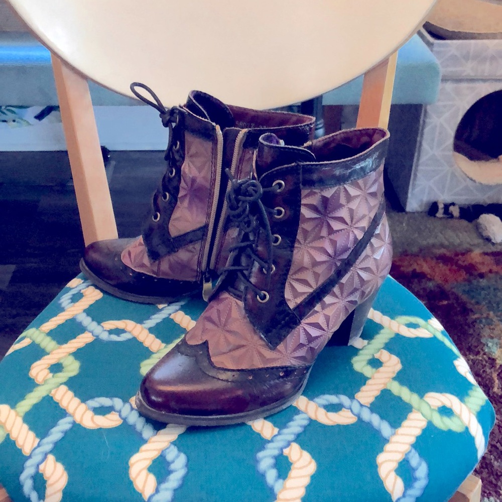 Ankle booties.  Side zip with lace fronts